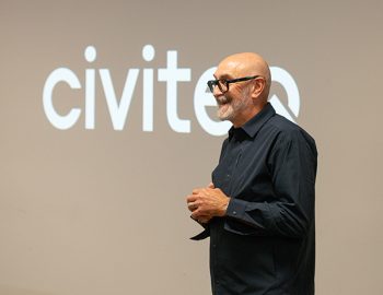 Tony Summers standing in front of a Civiteq logo