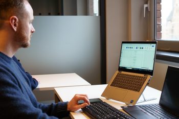 Man sat in front of laptop