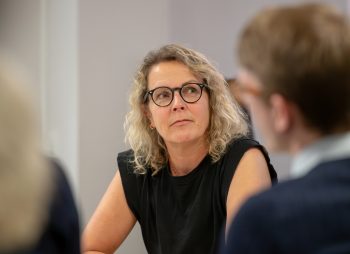 Lady chatting to a man