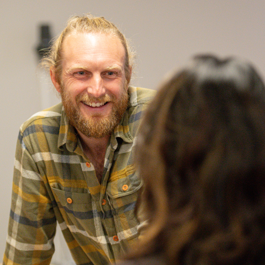 Man chatting to a woman