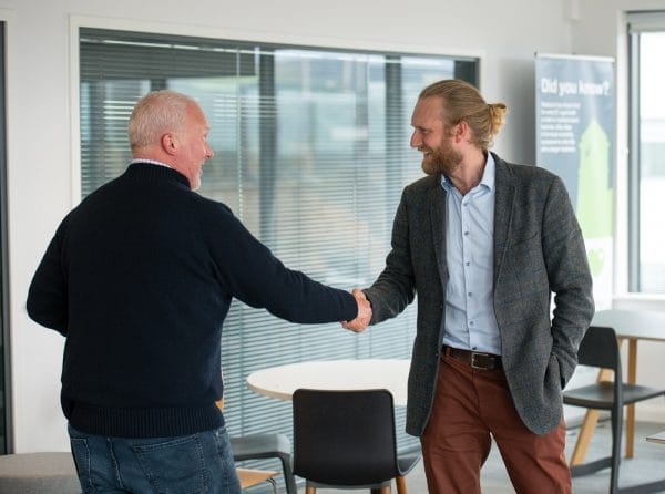 Two men shaking hands